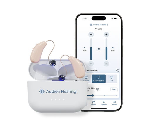Hearing aids with a smartphone displaying the Audien Hearing app on a white background